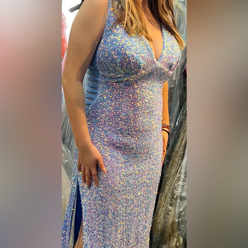 Prom dress size 12 worn once for prom, slit on side low back and mesh on sides.